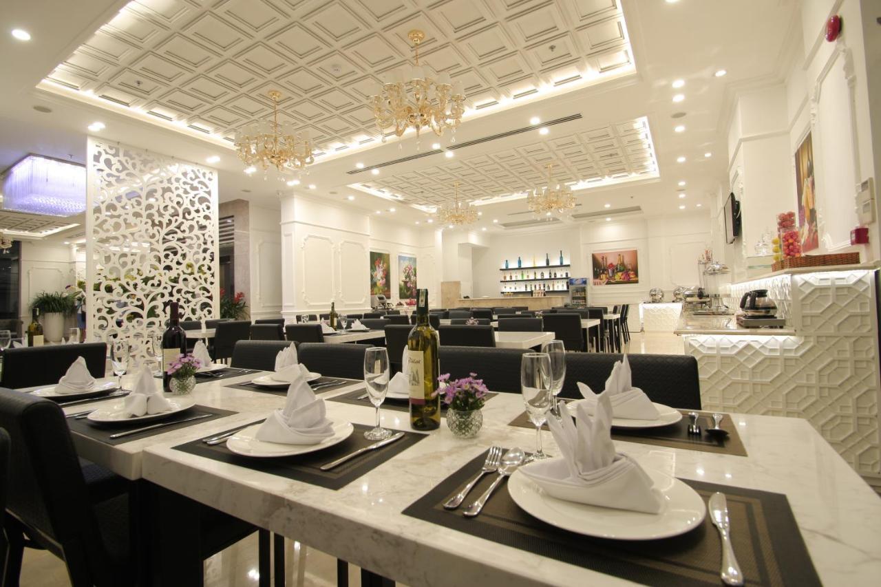 הו צ'י מין סיטי Acnos Grand Hotel מראה חיצוני תמונה