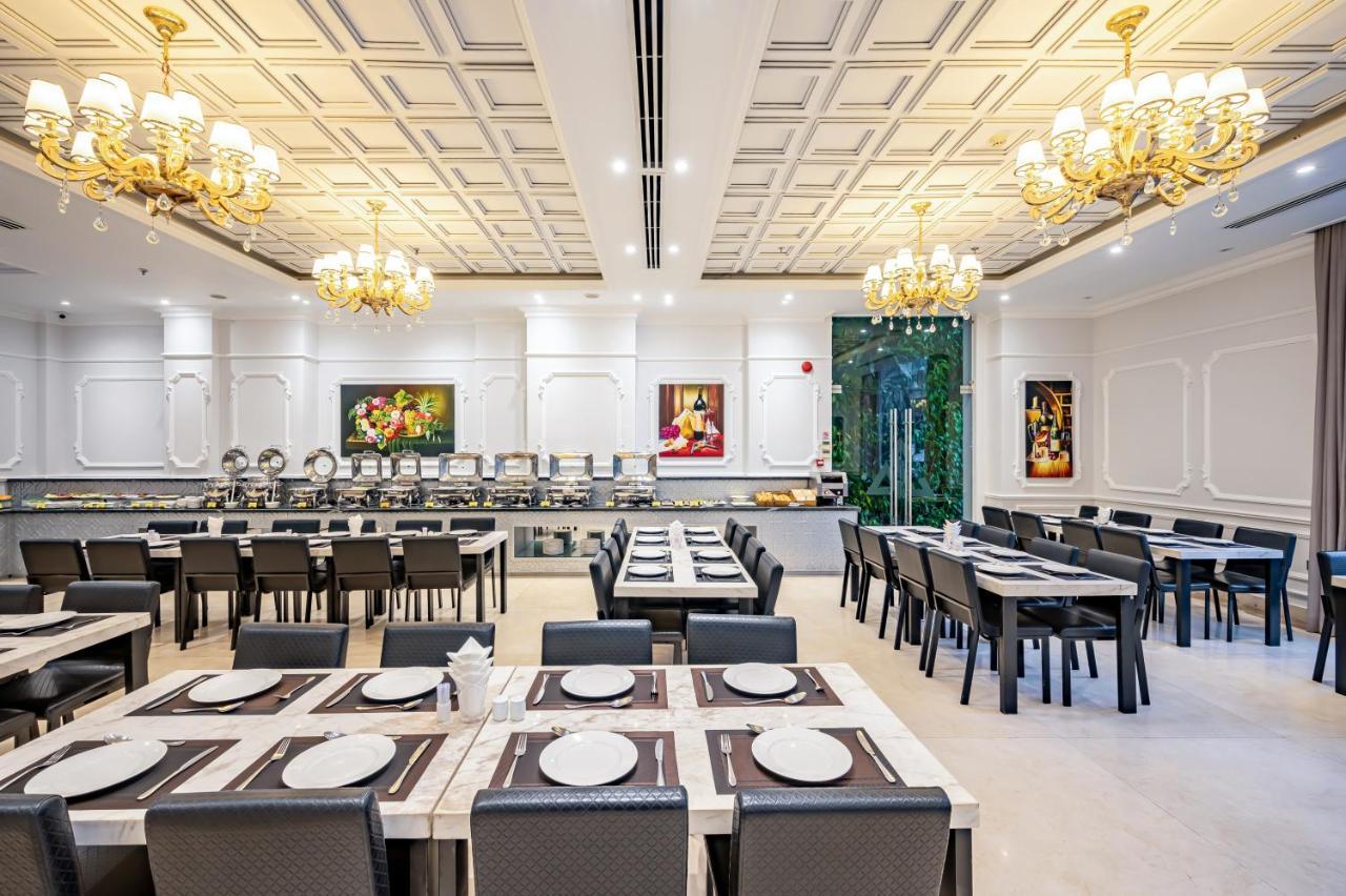 הו צ'י מין סיטי Acnos Grand Hotel מראה חיצוני תמונה
