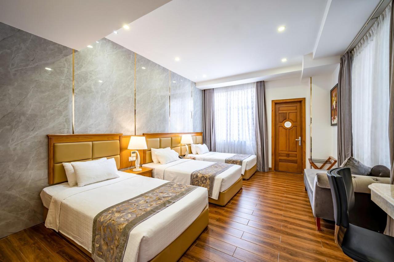 הו צ'י מין סיטי Acnos Grand Hotel מראה חיצוני תמונה