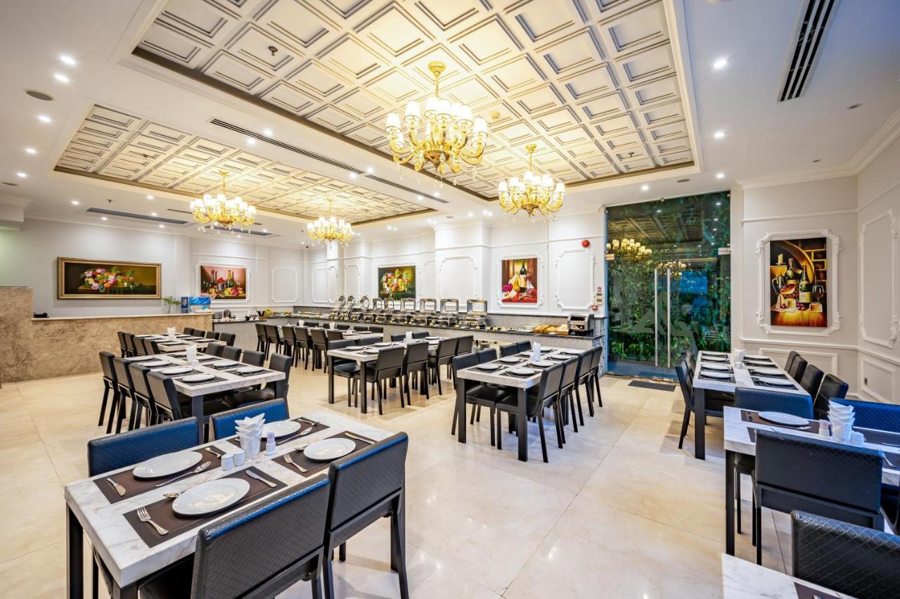 הו צ'י מין סיטי Acnos Grand Hotel מראה חיצוני תמונה
